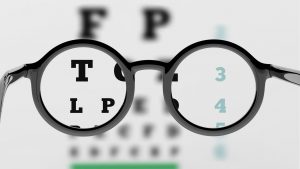 iage of glasses and an eye chart